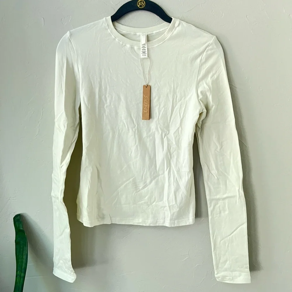 🤍SKIMS COTTON JERSEY LONG SLEEVE T-SHIRT IN BONE XS L - Picture 4 of 5